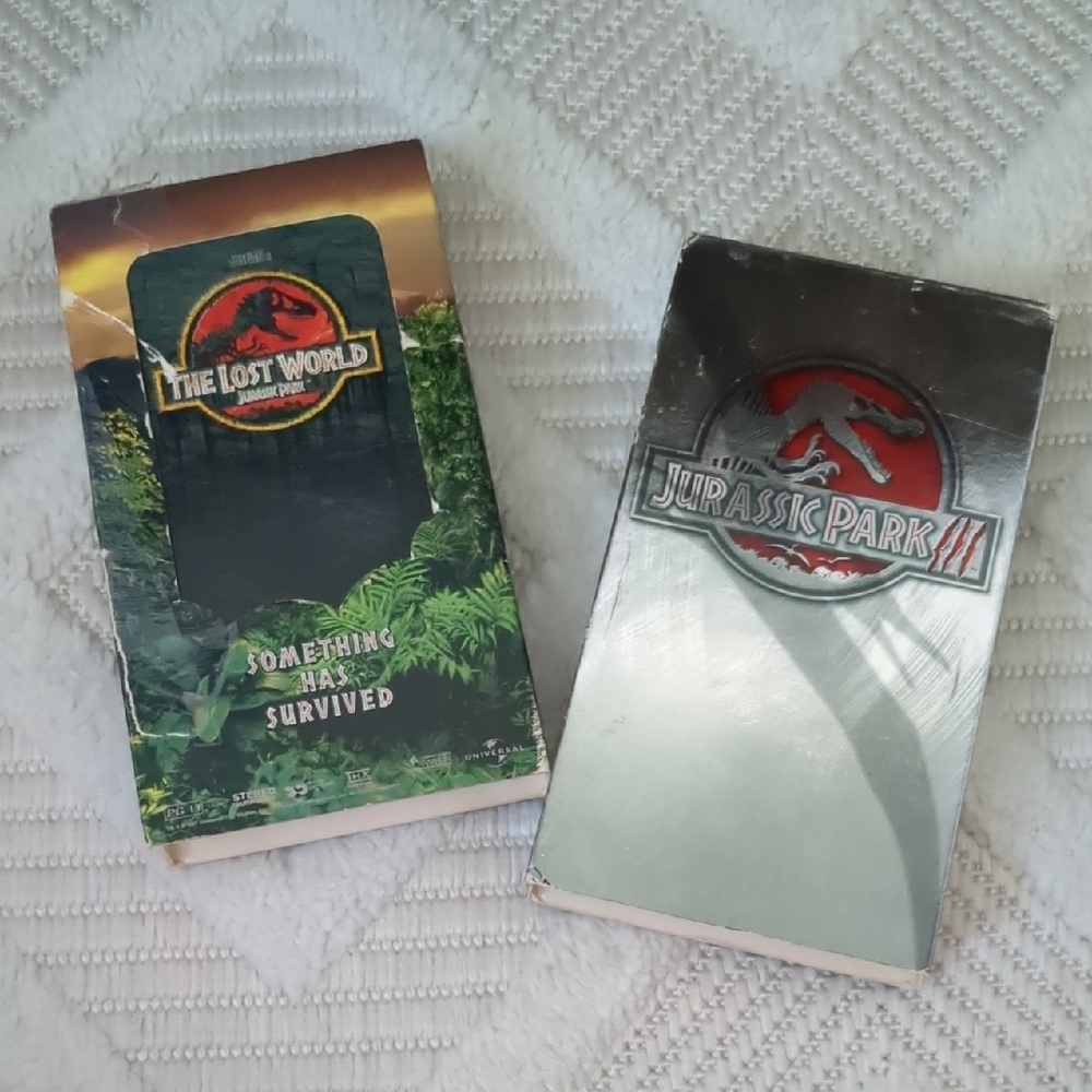 Universal Jurassic Park Silver and Red Tin Set